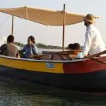 People in venice traditional boat