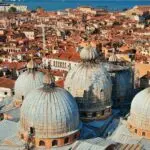 Aerial view of Venice's historic domed rooftops.